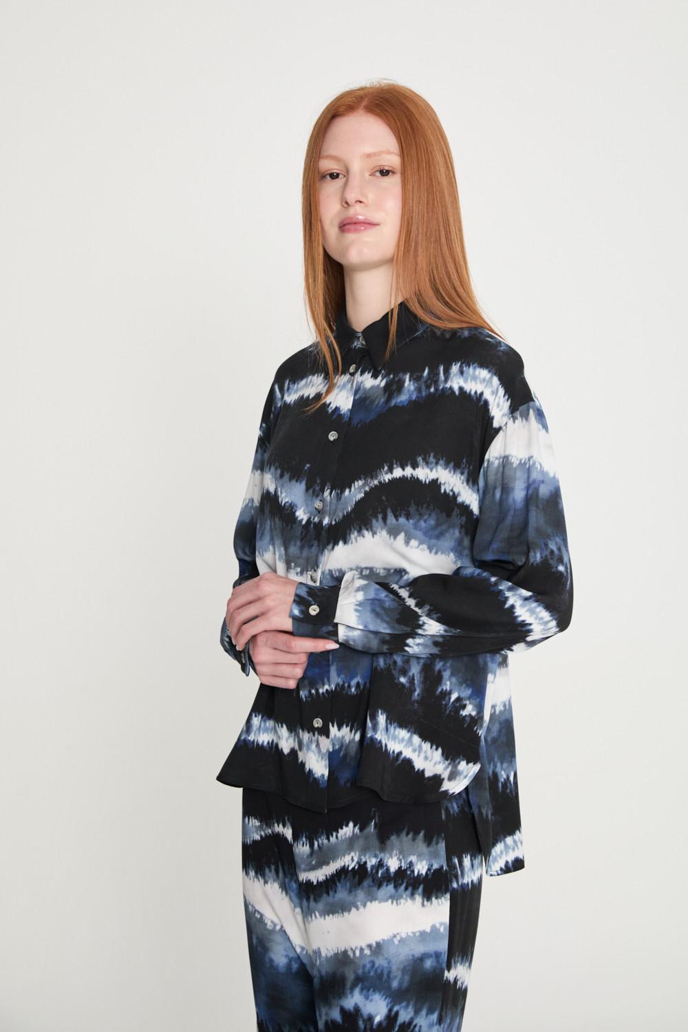 Designers society CAMISA TANGO Ahorra y exporta
