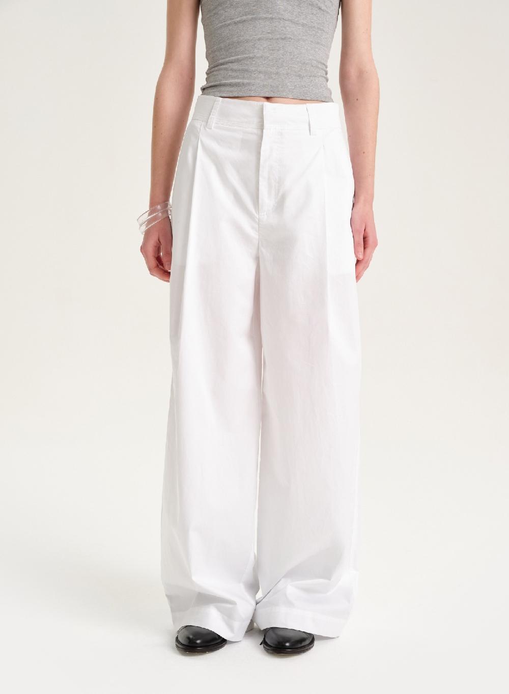 Etiqueta negra Pantalon poplin Devoluciones gratuitas