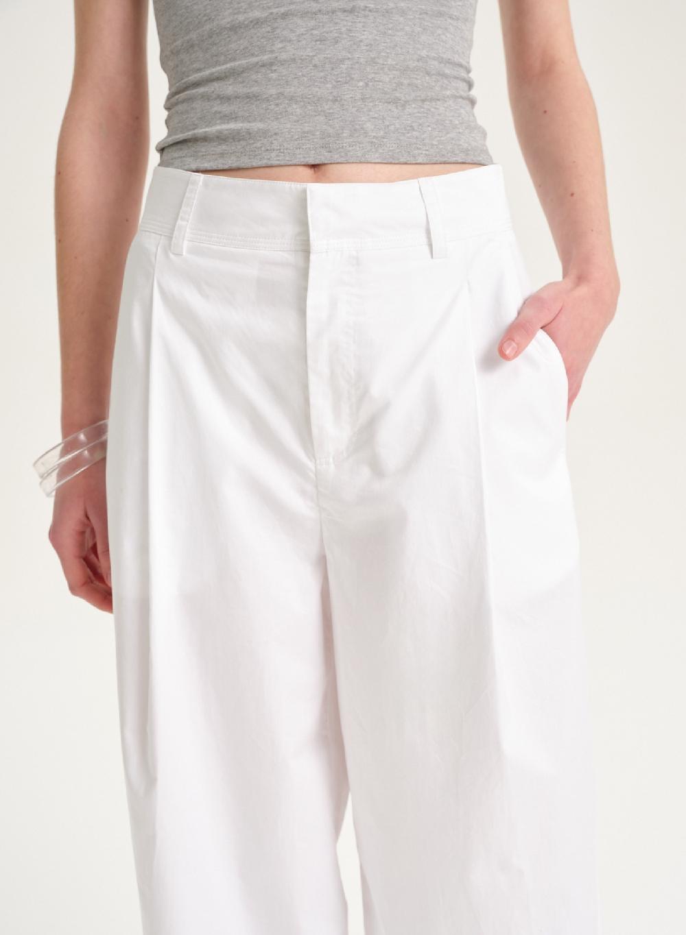 Etiqueta negra Pantalon poplin Devoluciones gratuitas
