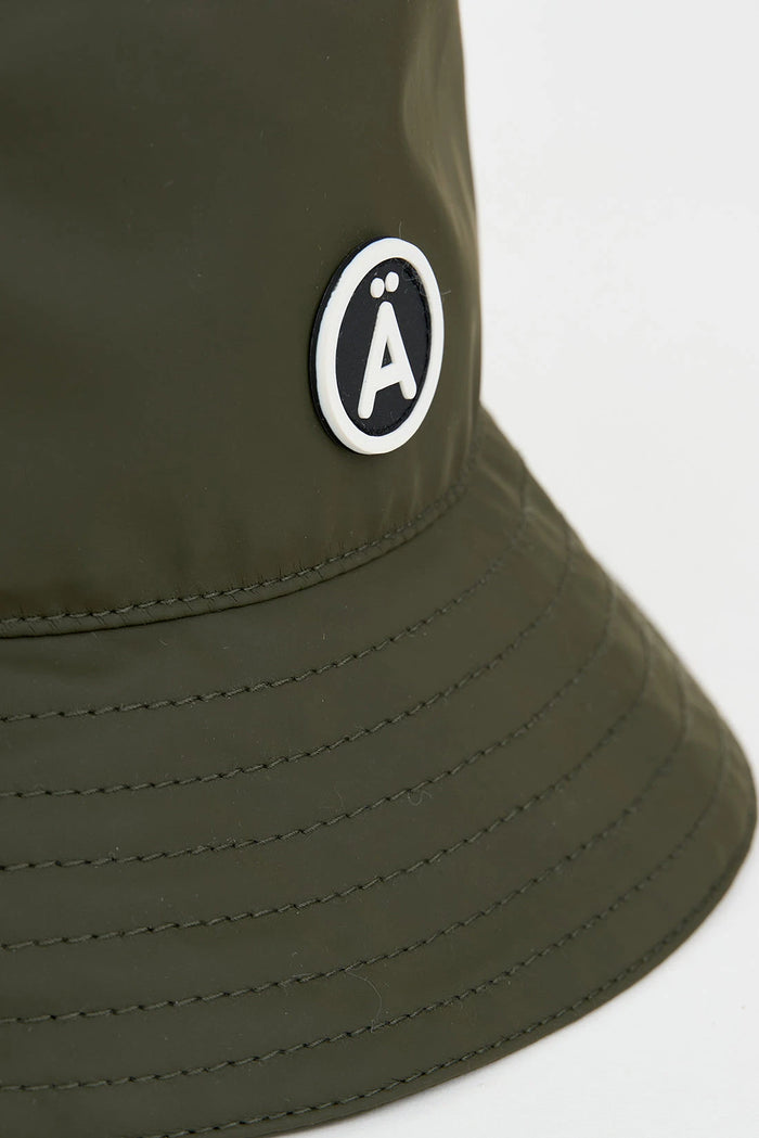 tantä rainwear Qanik Khaki Ahorra y exporta