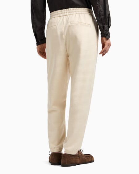 Armani Pantalones de chándal de punto de mezcla de lyocell con inscripción integral ASV Envío internacional gratuito