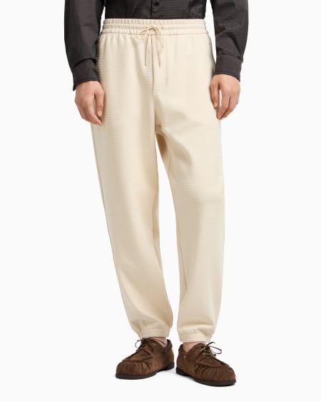 Armani Pantalones de chándal de punto de mezcla de lyocell con inscripción integral ASV Envío internacional gratuito